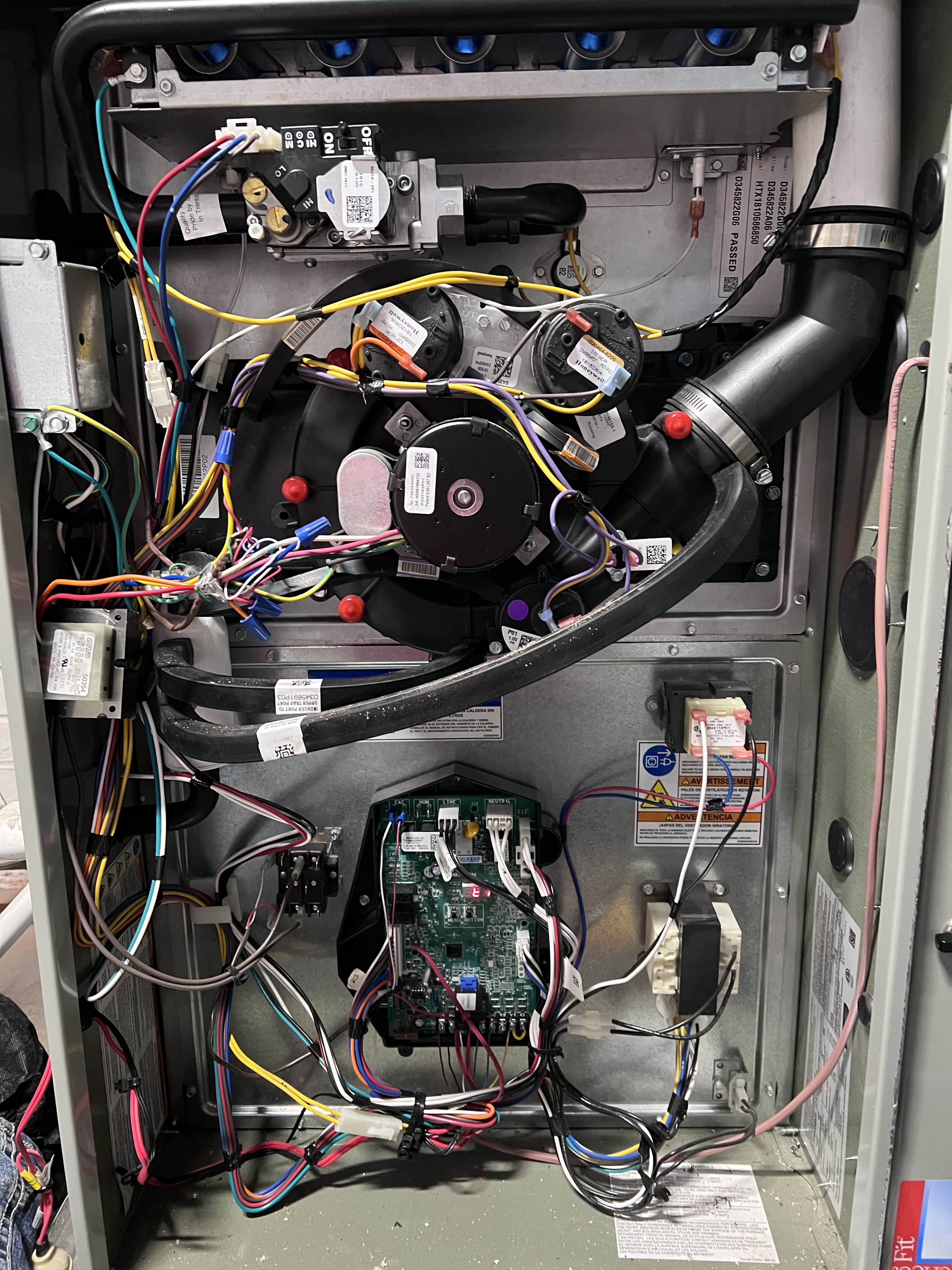 Charlotte AC repair technician working on a system